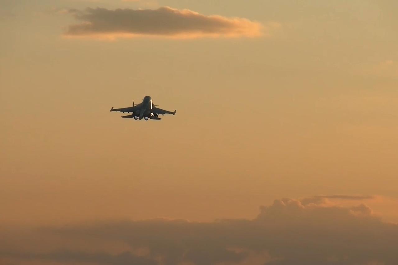 Un bombardier de l'armée russe. [KEYSTONE - Russian Defense Ministry Press Service via AP]