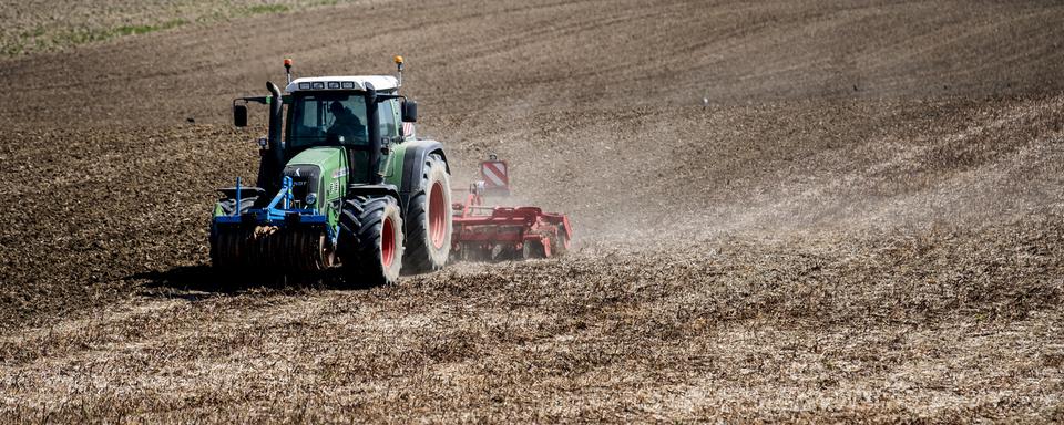 Trois Parlements cantonaux ont voté des résolutions en faveur du monde agricole. Image prétexte. [Keystone - Jean-Christophe Bott]