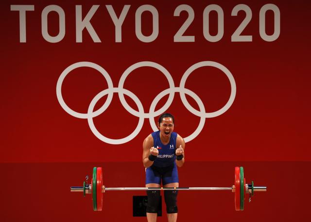 L'haltérophile Hidilyn Diaz a remporté à Tokyo la première médaille d'or olympique de l'histoire des Philippines. [KEYSTONE - JEON HEON-KYUN]