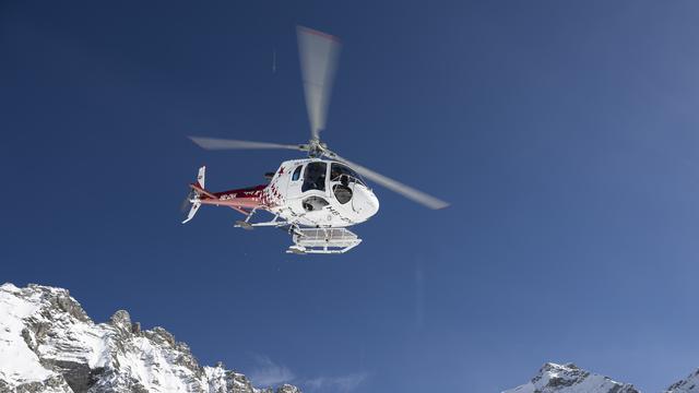Un hélicoptere de la compagnie aérienne Air-Glacier. (Image d'illustration) [Keystone - Anthony Anex]