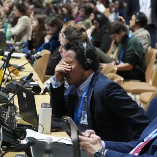 C'est l'heure du bilan pour la 29e conférence de l'ONU sur le climat, qui a été organisée cette année à Bakou en Azerbaïdjan. [Keystone/AP Photo - Joshua A. Bickel]