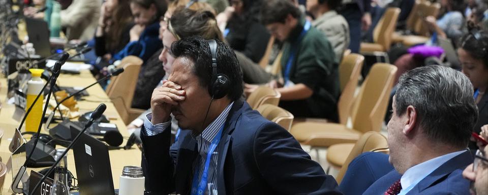 C'est l'heure du bilan pour la 29e conférence de l'ONU sur le climat, qui a été organisée cette année à Bakou en Azerbaïdjan. [Keystone/AP Photo - Joshua A. Bickel]