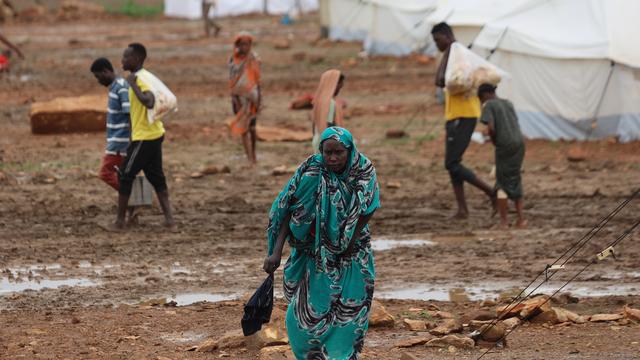 epa11494674 A Sudanese woman walks at the camp for people displaced due to fighting in Sinja town of Sennar State, established at Al-Huri, Gedaref city, eastern Sudan, 24 July 2024. According to UN Office for the Coordination of Humanitarian Affairs (OCHA), over 136,000 people fled Sennar since 24 June 2024 due to conflict between the Sudanese Armed Forces (SAF) and the Rapid Support Forces (RSF). US Secretary of State Antony Blinken said in a statement on 23 July 2024 that the US has invited the two fighting sides in Sudan to participate in ceasefire talks co-hosted by Switzerland and Saudi Arabia on 14 August 'to reach a nationwide cessation of violence, enabling humanitarian access to all those in need'. The leader of Sudanese RSF Mohamed Hamdan Daglo on 24 July announced on his X (formerly Twitter) account the participation in the US-mediated ceasefire talks in Switzerland, expressing support for reaching 'a peaceful, negotiated political solution that restores the country to civilian rule and the path of democratic transition'. According to the International Organization for Migration (IOM) figures, 10,594,576 individuals are internally displaced in Sudan, including 7,794,480 individuals displaced since the outbreak of armed conflict between the SAF and RSF on 15 April 2023. EPA/STR [EPA/STR - EPA/STR]