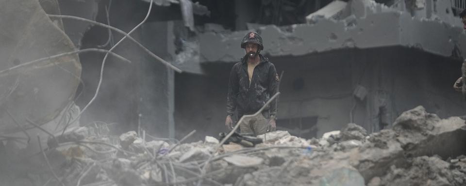 L'armée israélienne a mené jeudi soir deux raids aériens meurtriers contre le coeur de Beyrouth. [Keystone - AP Photo/Hussein Malla]