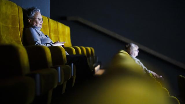 Les salles de cinéma restent moins fréquentées qu'avant le Covid en Suisse. [Keystone - Michael Buholzer]