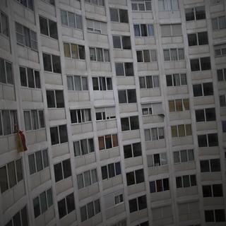 A building with apartments in Madrid. [Keystone - AP Photo/Andres Kudacki]