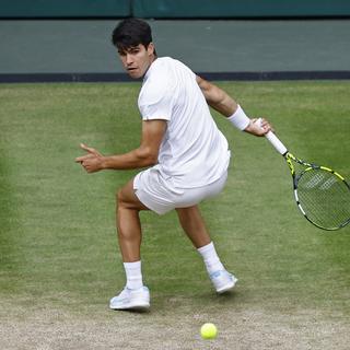 Le joueur Carlos Alcaraz à Wimbledon, le 12 juillet 2024. [Keystone - EPA/Tolga Akmen]