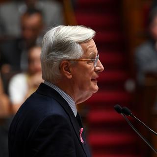 Michel Barnier devant l'Assemblée nationale. [Keystone - EPA/JULIEN MATTIA]