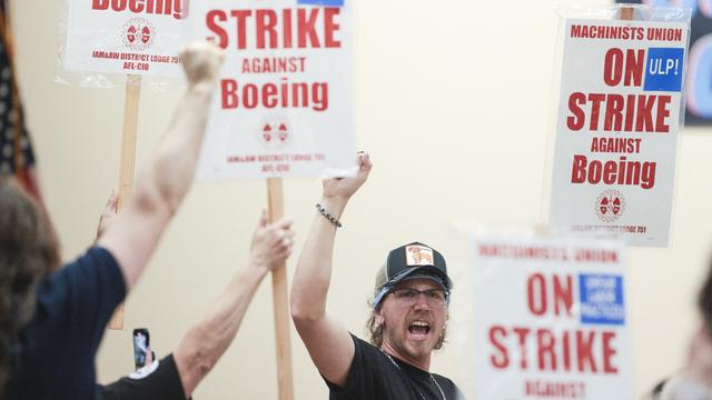 Les salariés de Boeing votent massivement pour la grève, la direction veut négocier. [AFP - JASON REDMOND]