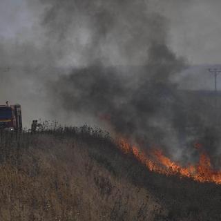 Les roquettes du Hezbollah ont provoqué des incendies sur le plateau du Golan occupé par Israël. [Keystone]