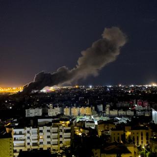 Smoke rises from an Israeli airstrike that hit the southern suburb of Beirut, Lebanon, Tuesday, Oct. 1, 2024. [AP Photo/Keystone - Hussein Malla]