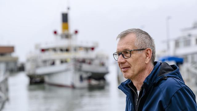 Pierre Imhof, directeur général de la CGN, devant le "Simplon". [Keystone - Jean-Christophe Bott]