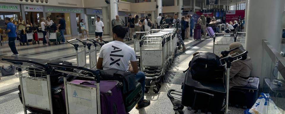 L'aéroport de Beyrouth devient point de fuite face à la crainte d'une guerre totale entre Israël et le Hezbollah libanais. [EPA/KEYSTONE - WAEL HAMZEH]