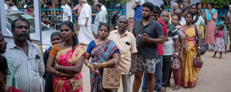 Les premiers bureaux de vote ont ouvert vendredi en Inde pour des élections législatives. [EPa/Keystone - Ragul Krishnan]