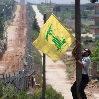 Le Conseil fédéral s'oppose à l'interdiction du Hezbollah en Suisse. [Keystone - Mohammed Zaatari]