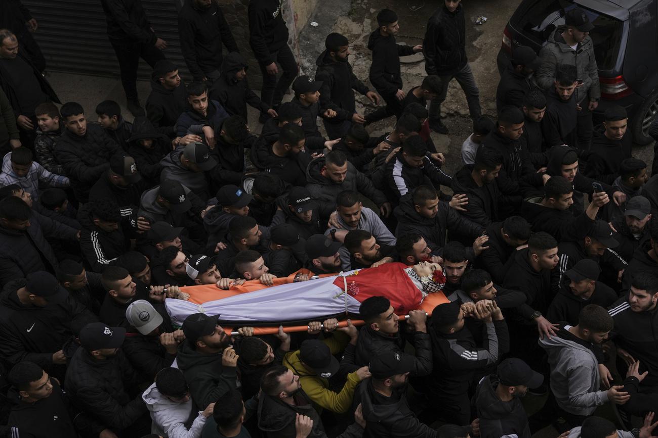 Funérailles d'un adolescent palestinien, tué le 4 mars 2024 par l'armée israélienne dans un camp de réfugiés selon le ministère palestinien de la Santé [Keystone/AP Photo - Mahmoud Illean]