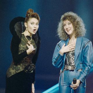 Lolita Morena, Céline Dion et Jacques Deschenaux lors du 34ème concours Eurovision le 6 mai 1989, à Lausanne. [KEYSTONE - Archives]