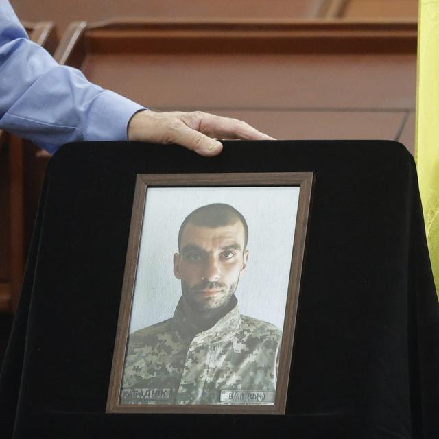 A portrait of late Ukrainian serviceman Matisyahu (Anton) Samborsky is displayed during his farewell ceremony at the Central Synagogue in Kyiv, Ukraine, 12 September 2024. Samborsky, son of Ukraine's chief rabbi Moshe Reuven Azman, was killed during fighting on the frontline in the Donetsk region. He had been officially listed as missing in action in late July. Russian troops entered Ukrainian territory on 24 February 2022, starting a conflict that has provoked destruction and a humanitarian crisis. [EPA/Keystone - SERGEY DOLZHENKO]