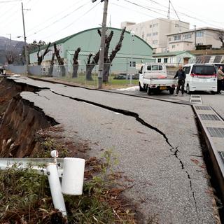 Les dégâts aux infrastructures ont été importants en certains endroits de la péninsule de Noto, au Japon. [AFP - Yusuke Fukuhara]