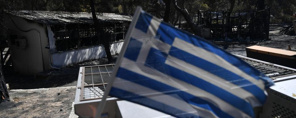 Après les incendies, l’heure est aux explications politiques en Grèce. [Keystone - Michael Varaklas]