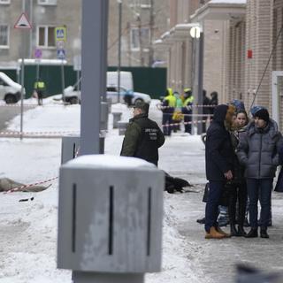 Des investigateurs sur place après le meurtre du général Igor Kirillov et de son assistant à Moscou, le 17 décembre 2024. [AP Photo/Keystone]