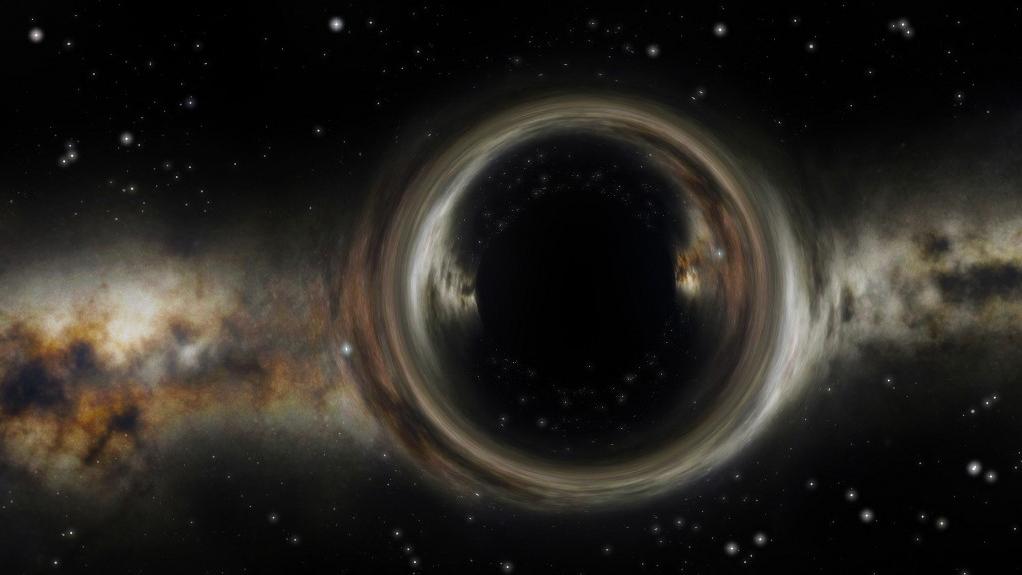 Illustration d'artiste d'un trou noir, un objet si compact que rien ne peut échapper de sa force gravitationnelle, même pas la lumière. [Science Photo Library via AFP - Mark Garlick/MGA]