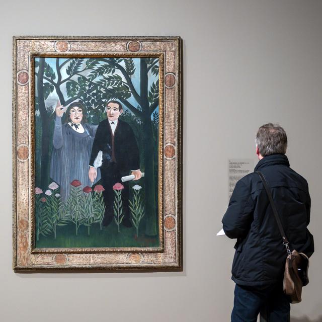"La muse inspirant son poète" d'Henri Rousseau exposé au Kunstmuseum de Bâle, ici en 2019. [Keystone - Georgios Kefalas]