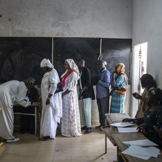 La population sénégalaise élit son nouveau président au Sénégal. [AP Photo/ Keystone - Mosa'ab Elshamy]