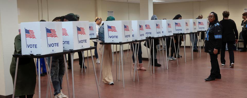 Des électeurs dans le Michigan. [Reuters - Rebecca Cook]