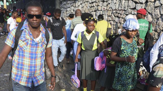 En Haïti, plus de 700’000 déplacés, dont la moitié sont des enfants. [KEYSTONE - ODELYN JOSEPH]