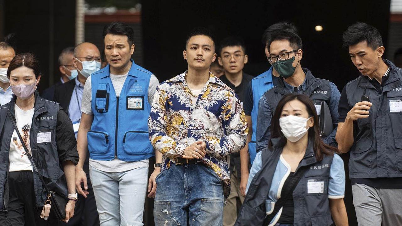 A Hong Kong, 14 militants prodémocratie ont été reconnus coupables de "subversion". [Keystone]