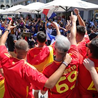 Des supporters dans les rues de Munich avant la demie finale de l'Euro entre l'Espagne et le France, le 9 juillet 2024. [Keystone - Christian Charisius]