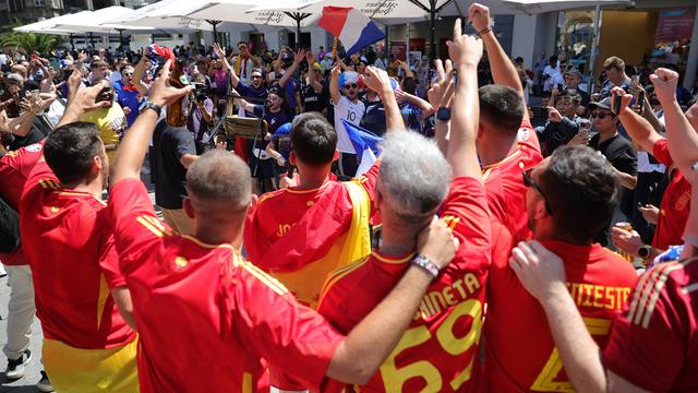 Des supporters dans les rues de Munich avant la demie finale de l'Euro entre l'Espagne et le France, le 9 juillet 2024. [Keystone - Christian Charisius]