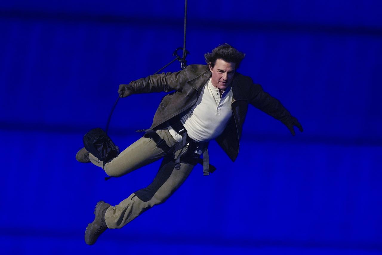 Tom Cruise a fait une entrée spectaculaire. [Natacha Pisarenko - Keystone]