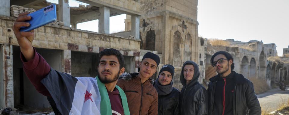 Les habitants reviennent dans les zones prises par les rebelles en Syrie. [KEYSTONE - GHAITH ALSAYED]