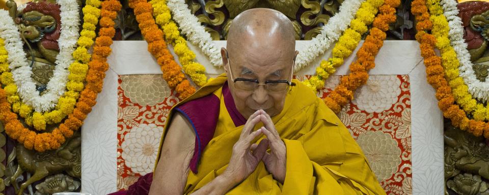 Le dalaï lama est attendu en Suisse ce week-end. [Keystone - Ashwini Bhatia - AP Photo]