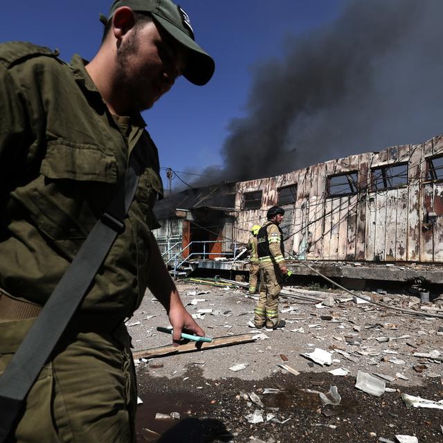 Firefighters douse a fire after projectiles fired from Lebanon hit an emergency storage in the Kiryat Shmona municipality, northern Israel, 24 September 2024. Hezbollah fired rockets on the northern Israeli city of Kiryat Shmona. According to the Israeli authorities, the strikes did not make victims but caused several fires. Israel's army had struck Lebanon in the past 24h against what it said was 'dozens of Hezbollah targets in numerous areas in southern Lebanon'. The Lebanese Health Ministry said on 23 September that almost 500 people were killed following the Israeli strikes on Lebanon. EPA/ATEF SAFADI [EPA/KEYSTONE - ATEF SAFADI]