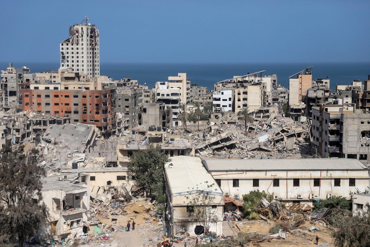 Des quartiers entiers de Gaza City ont été détruits par les bombardements israéliens. [KEYSTONE - MOHAMED HAJJAR]