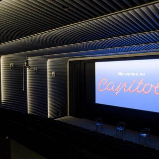 Le mythique cinéma Capitole de Lausanne retrouve son lustre, complètement restauré et agrandi. [Keystone]