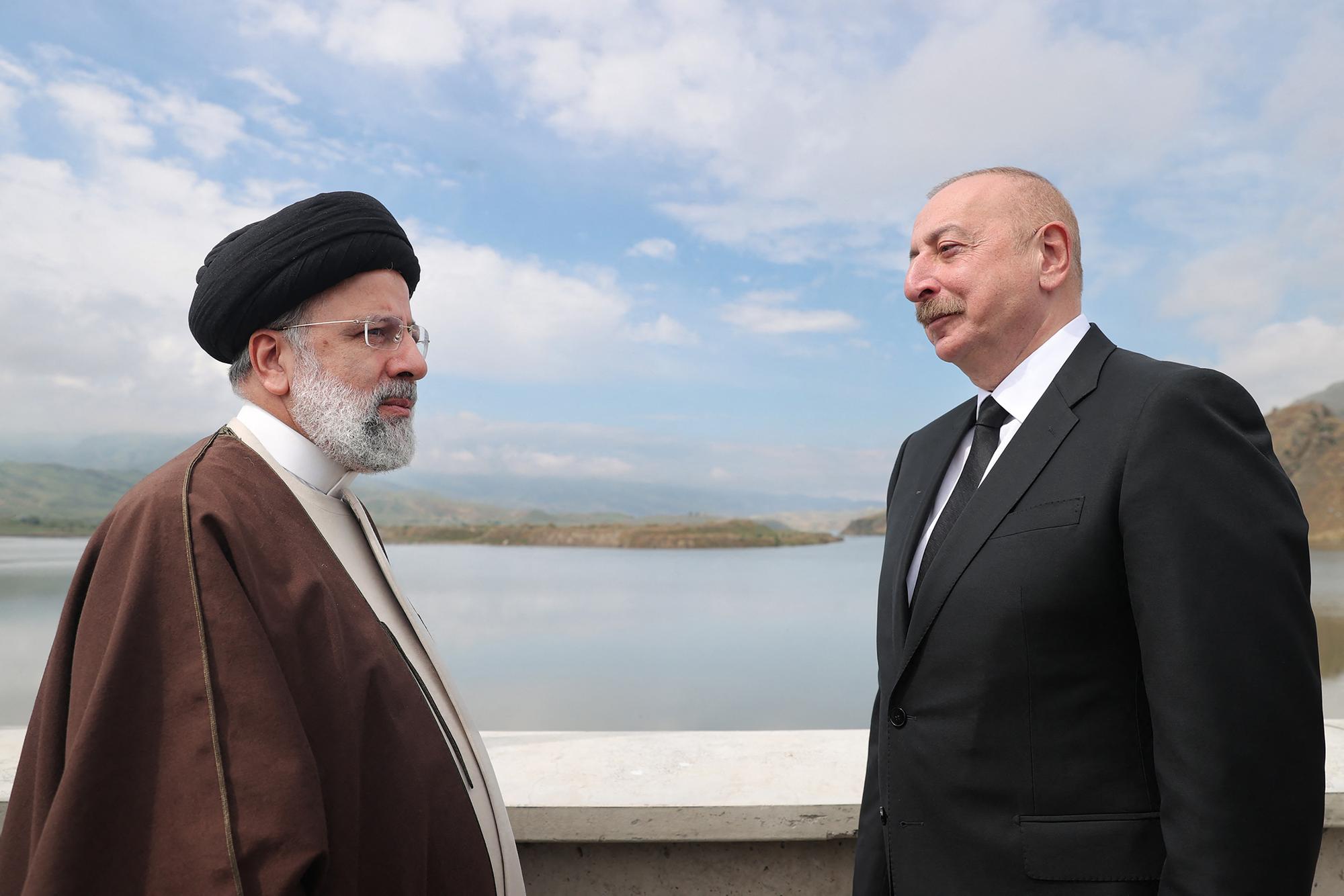 Ebrahim Raïssi a inauguré dimanche un barrage à la frontière avec l'Azerbaïdjan en compagnie du président de l'Azerbaïdjan, Ilham Aliev. [AFP - -]