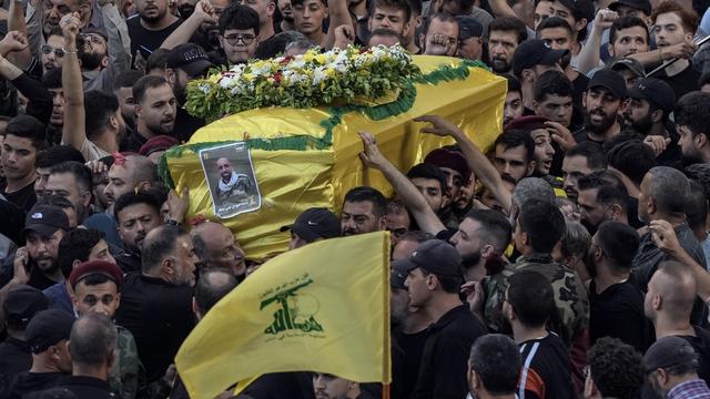 Les deux attaques contre le Hezbollah font craindre une guerre à grande échelle. [AP Photo/KEYSTONE - Bilal Hussein]