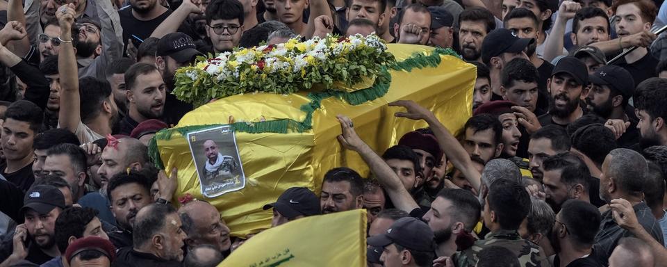 Les deux attaques contre le Hezbollah font craindre une guerre à grande échelle. [AP Photo/KEYSTONE - Bilal Hussein]