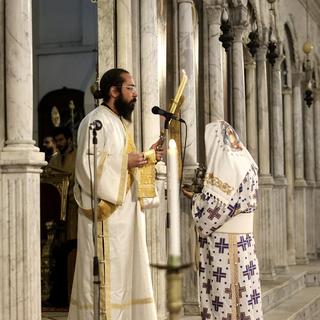 Des syriens membres de l'Eglise catholique lors d'une messe à la Cathédrale mariamite de Damas, en Syrie. 22 décembre 2024. [EPA/KEYSTONE - MOHAMMED AL RIFAI]