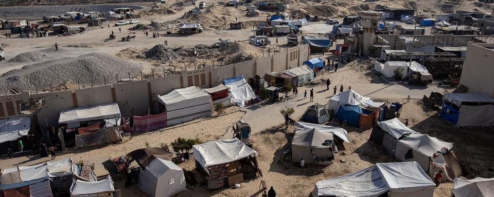 Un camp de réfugiés palestiniens au Sud de la bande de Gaza. [Keystone - EPA/Haitham Imad]