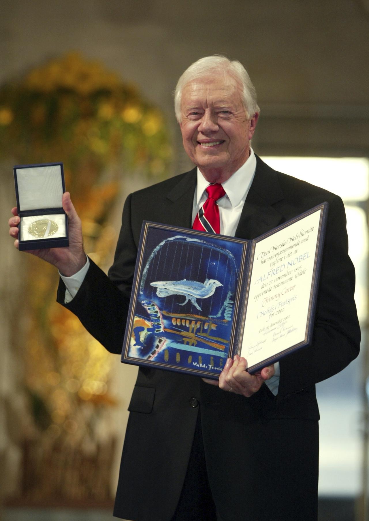 Jimmy Carter lors de la remise du Prix Nobel de la Paix en 2002. [KEYSTONE - BJOERN SIGURDSON]