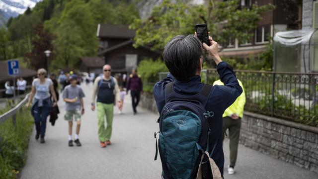 Les visiteurs étrangers ont dépensé quelque 18,4 milliards de francs en Suisse en 2023. [KEYSTONE - ANTHONY ANEX]