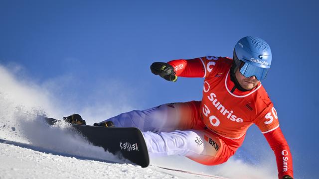 Dario Caviezel a pris une bonne 2e place à Davos. [KEYSTONE - GIAN EHRENZELLER]