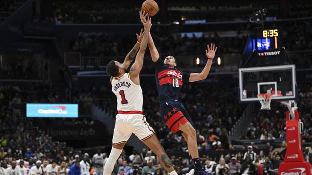 Kyshawn George (no 18) a réussi son meilleur match en NBA face à Golden State. [KEYSTONE - TERRANCE WILLIAMS]