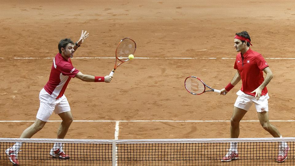 Stan Wawrinka et Roger Federer s'étaient donné rendez-vous il y a 10 ans pour installer la Suisse sur le toit du monde. [KEYSTONE - SALVATORE DI NOLFI]