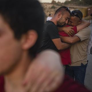 Témoignage d'un jeune palestinien qui a été libéré de prison. [Keystone/AP Photo - Bram Janssen]